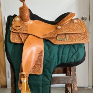A saddle on the back of a horse.